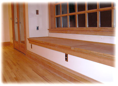 Recessed window seat with flip top seats