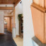A diptych showing details a spacious entryway and custom woodwork.